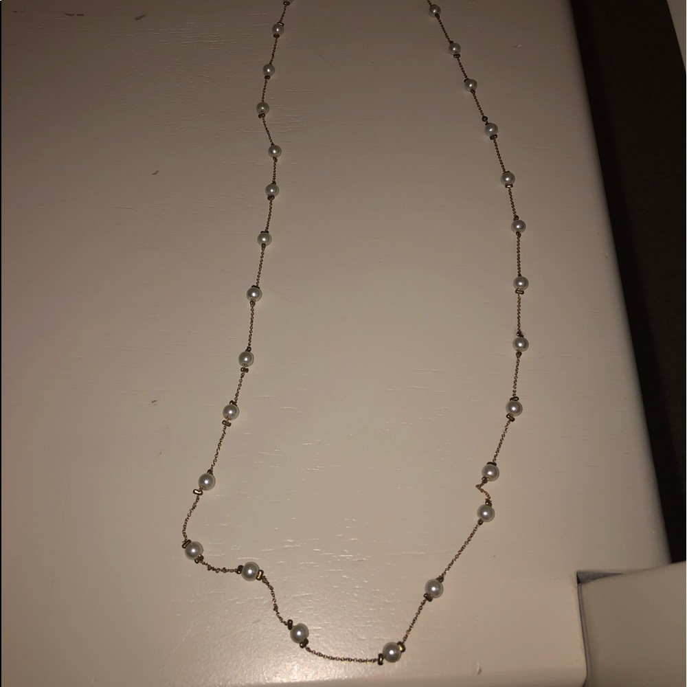 two DIFFERENT pearl necklaces